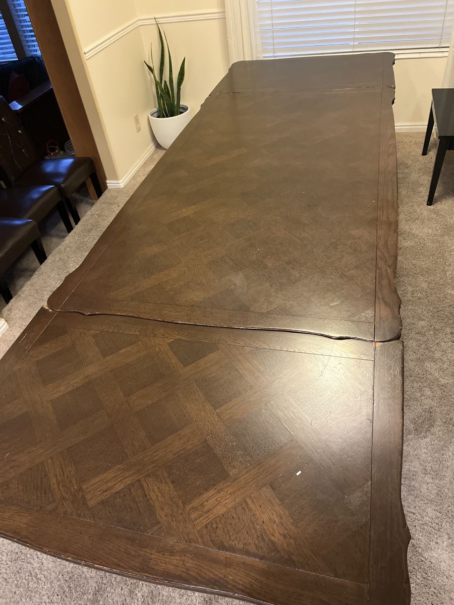 Expandable Wood Dining Table with Two self- store Leaves - Dark Brown