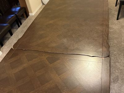 Expandable Wood Dining Table with Two self- store Leaves - Dark Brown