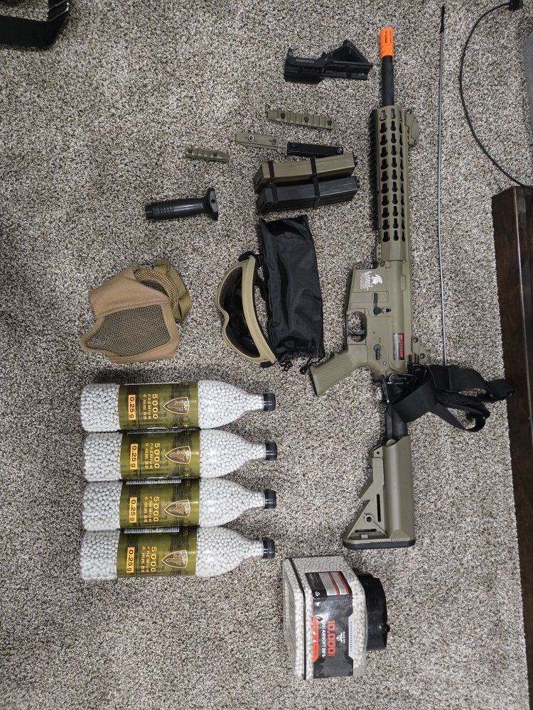Lancer Tactical Airsoft rifle and accessories