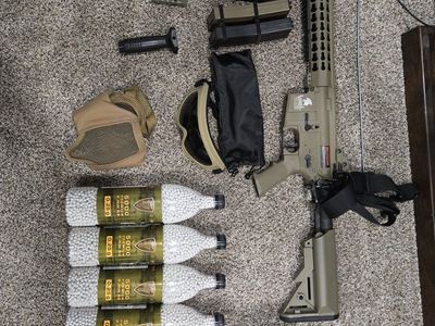 Lancer Tactical Airsoft rifle and accessories