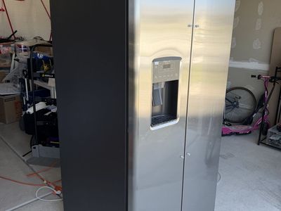 GE Profile Stainless Steel Side-by-Side Refrigerator with Water and Ice Dispenser - Gently Used
