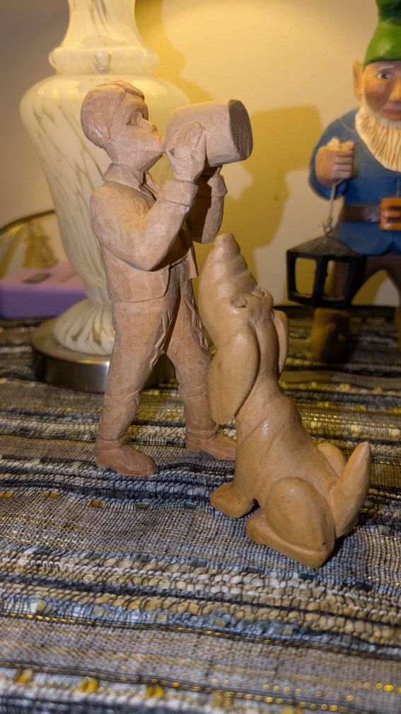 Vintage Handcarved boy and hound 

In excellent condition.