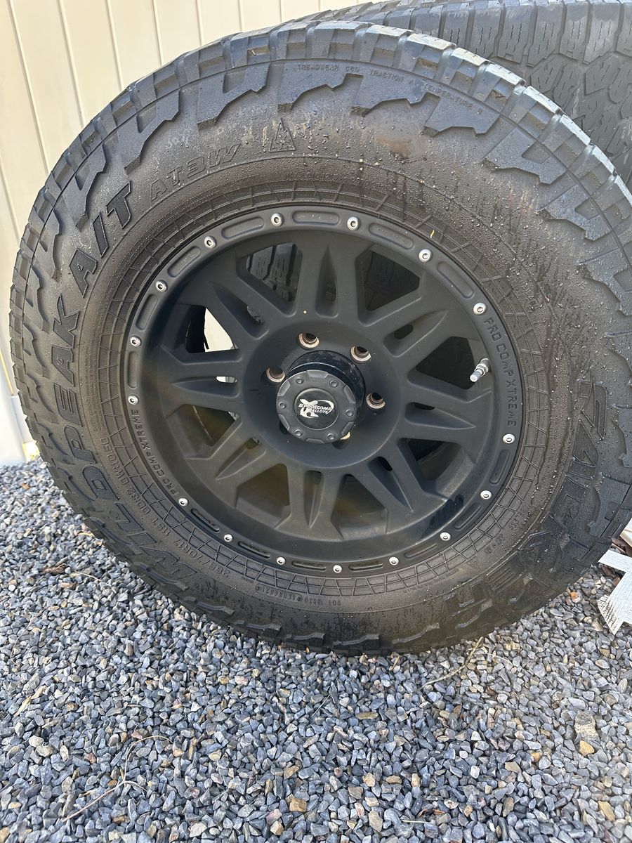 17 6x5.5 Wheels | 265/70 17 Wildpeak A/T Tires