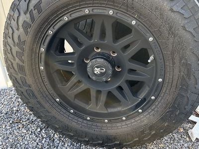 17 6x5.5 Wheels | 265/70 17 Wildpeak A/T Tires