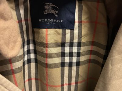 Men’s tall Burberry trenchcoat $175