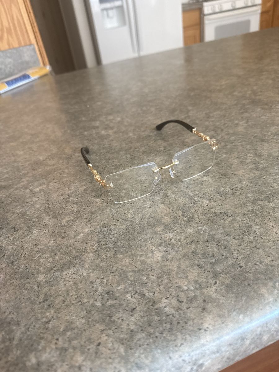 Luxury Rimless Clear Lens Glasses with Gold Temple Detail