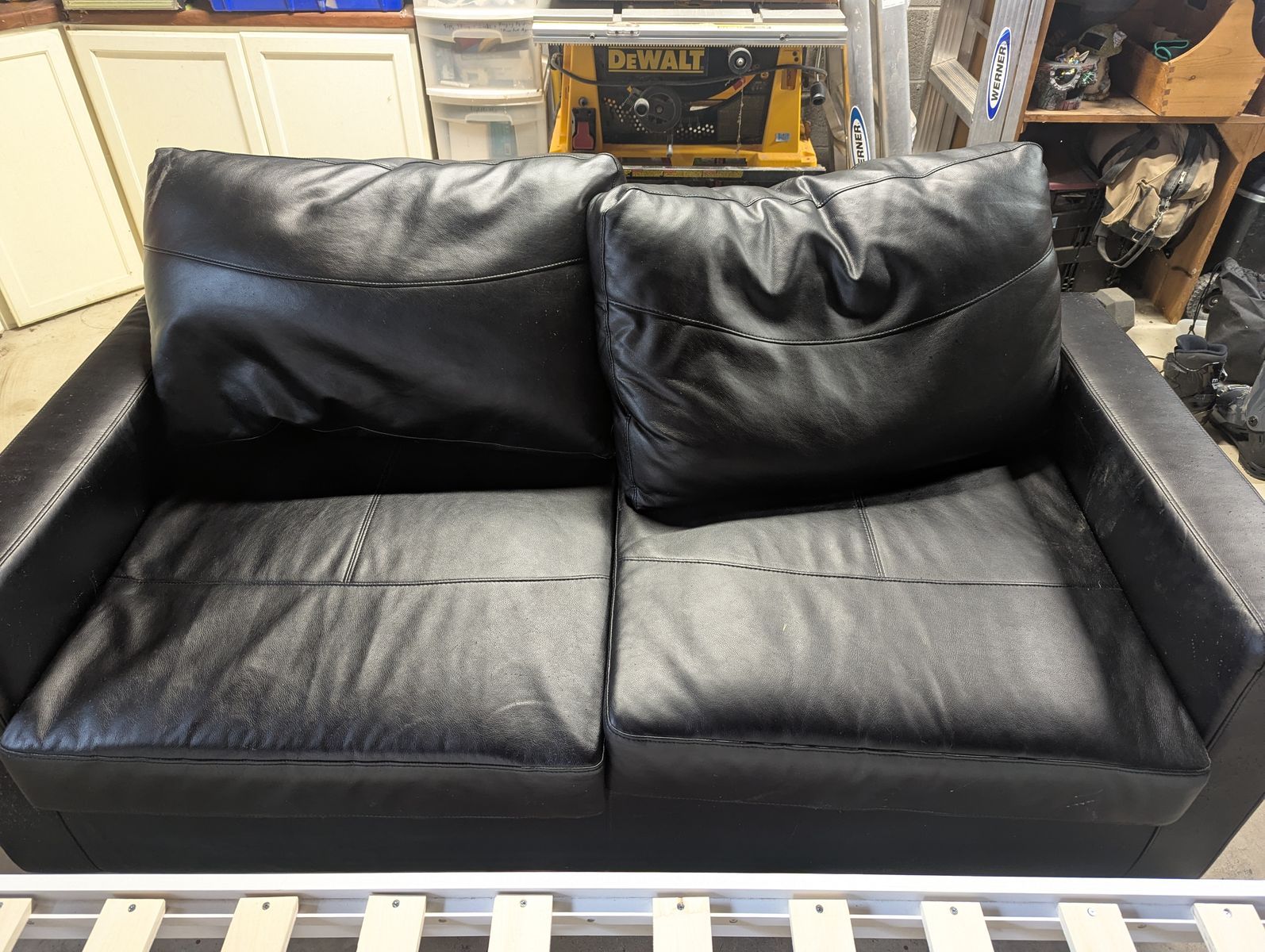 Black pullout couch, full sized bed