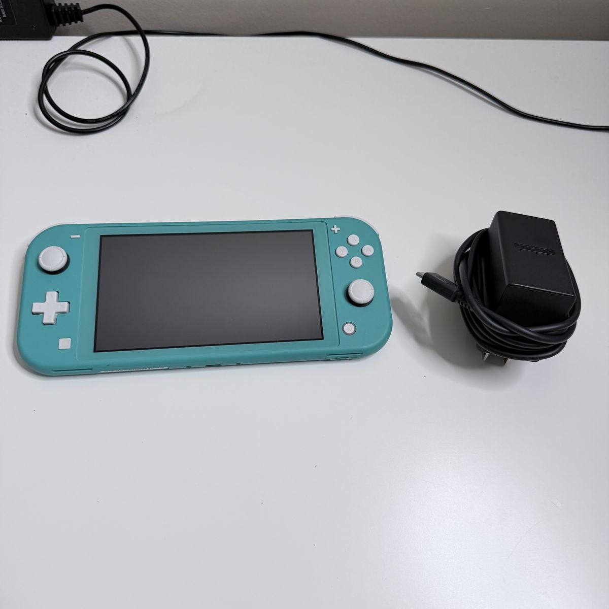 Nintendo Switch Lite (Turquoise) – Clean & Ready