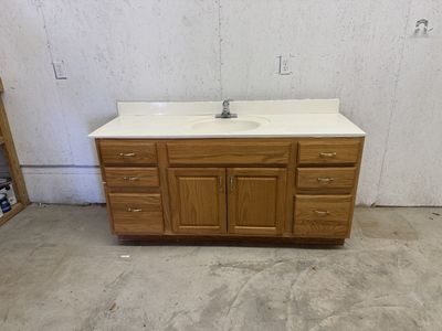 Oak Bathroom Vanity with White Countertop, Cabinets & Drawers