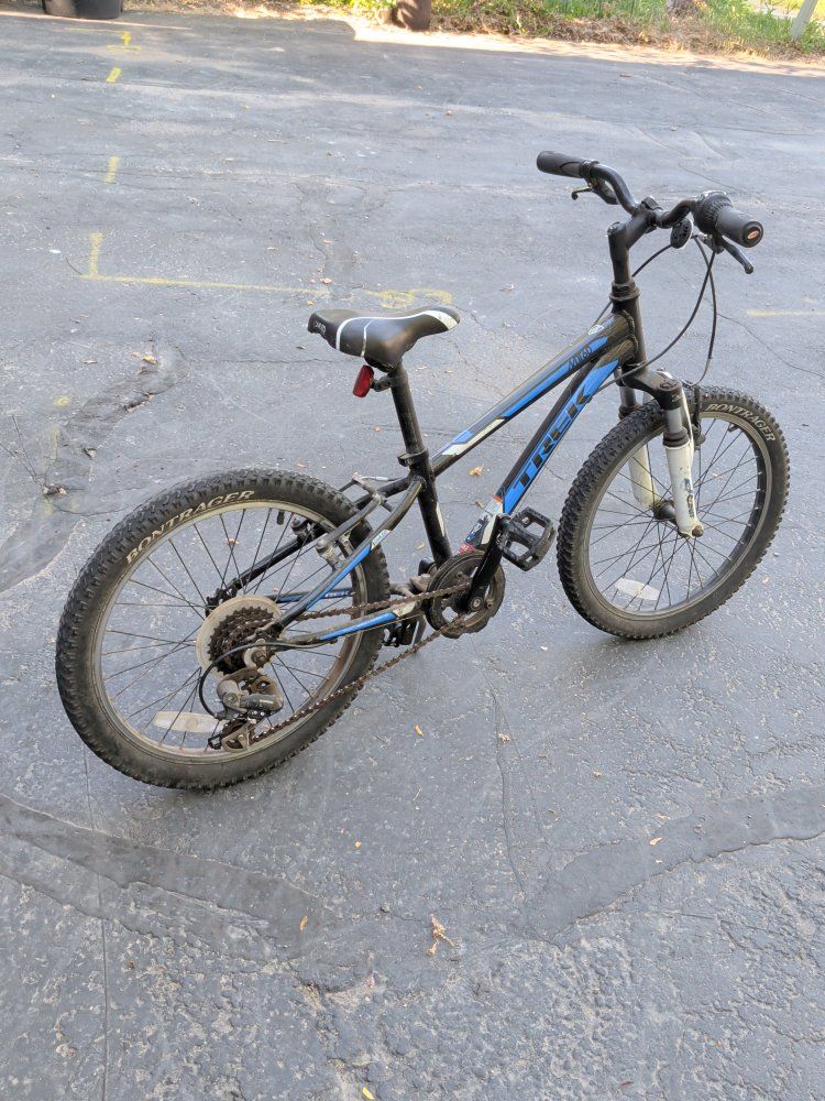 Trek MT 60 24" Kids' Mountain Bike - Black/Blue, Aluminum Frame, Front Suspension
