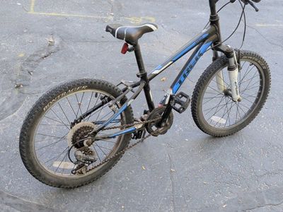 Trek MT 60 24" Kids' Mountain Bike - Black/Blue, Aluminum Frame, Front Suspension