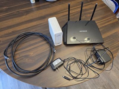 Arris SURFboard SB6183 Cable Modem and Netgear Nighthawk Smart WiFi Router AC1750 Bundle