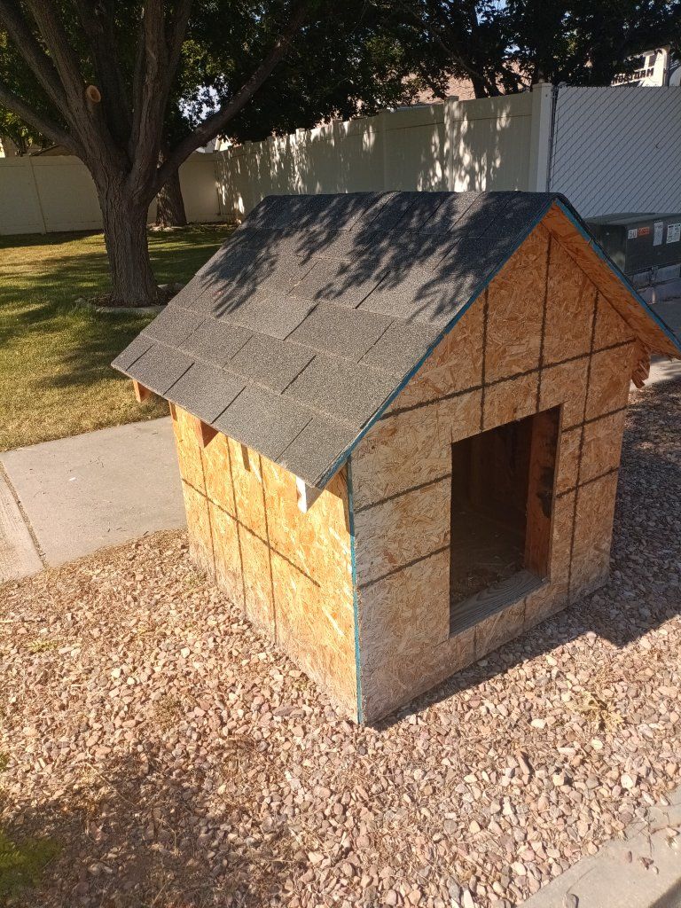 Handmade Wooden Dog House - Sturdy Construction, Shingled Roof, Pet Shelter