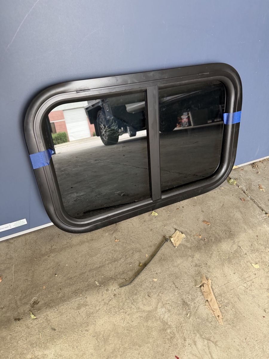 Camper window slider