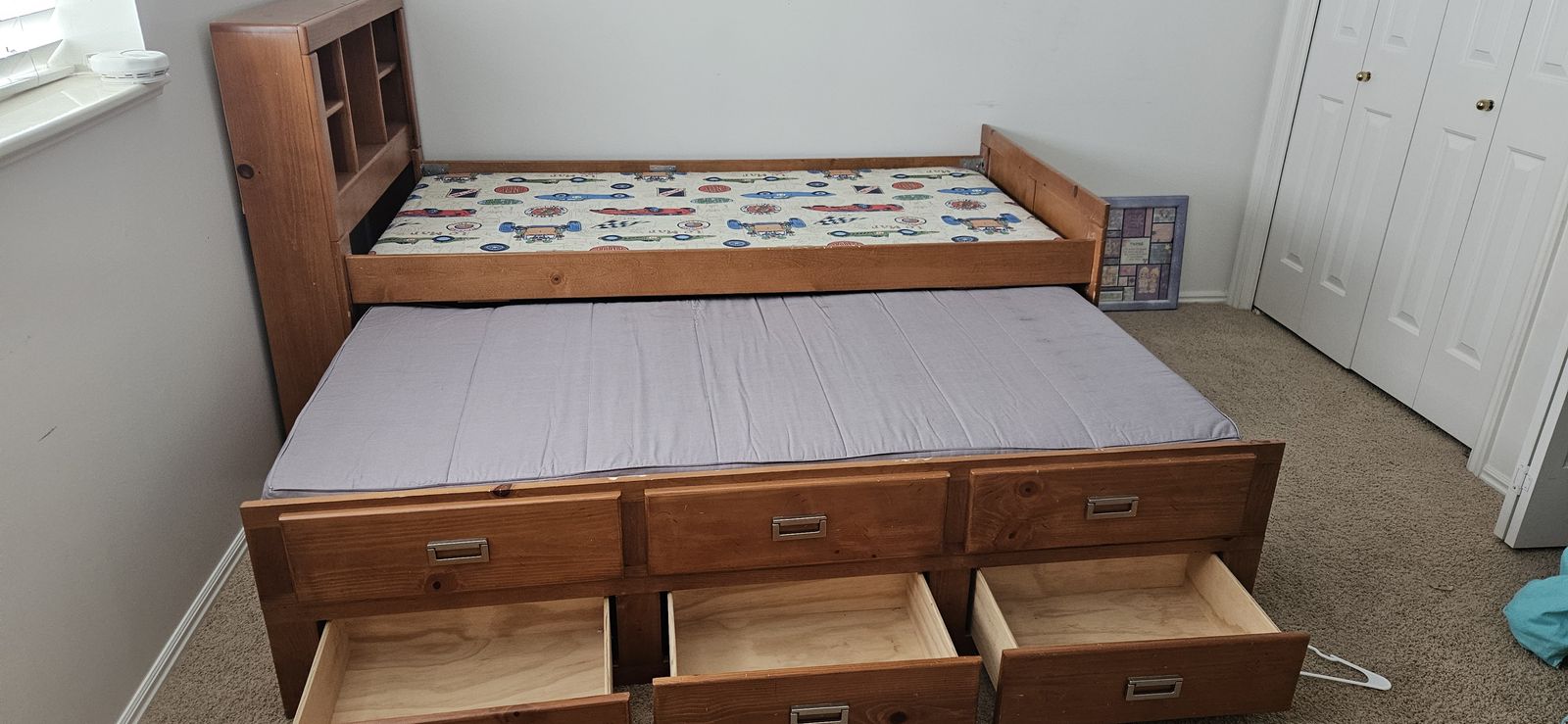 Twin Trundle bed with bunk board