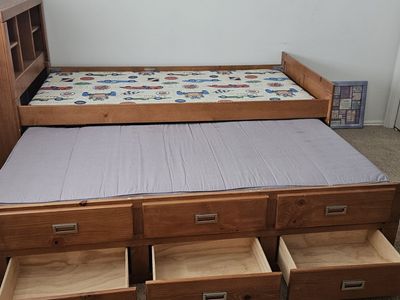 Twin Trundle bed with bunk board