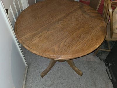 Oak Round Dining Table with 9 matching chairs, leaf and Pedestal Base