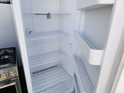 $550 OBO Good freezer convertible fridge 21”cb