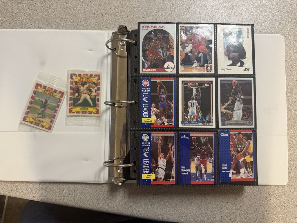 342 BASKETBALL CARDS. MOSTLY OLDER ONES. FEW FOOTBALL AND BASEBALL.