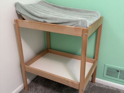 Baby changing table with changing pad/cover
