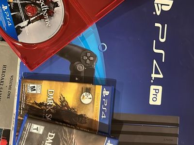PS4 pro with games and one controller