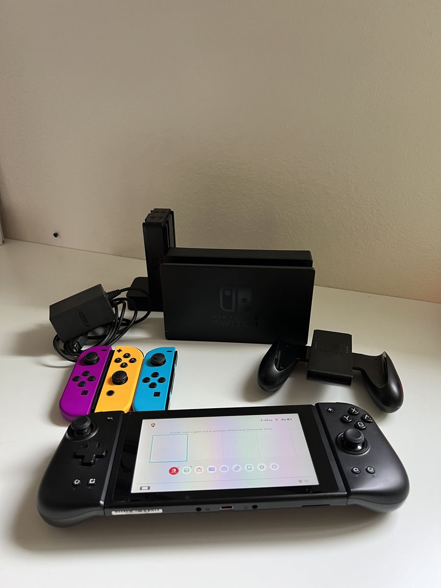 Nintendo Switch Bundle – 3 Official Joy-Cons + Charger + Dock (Great Condition)