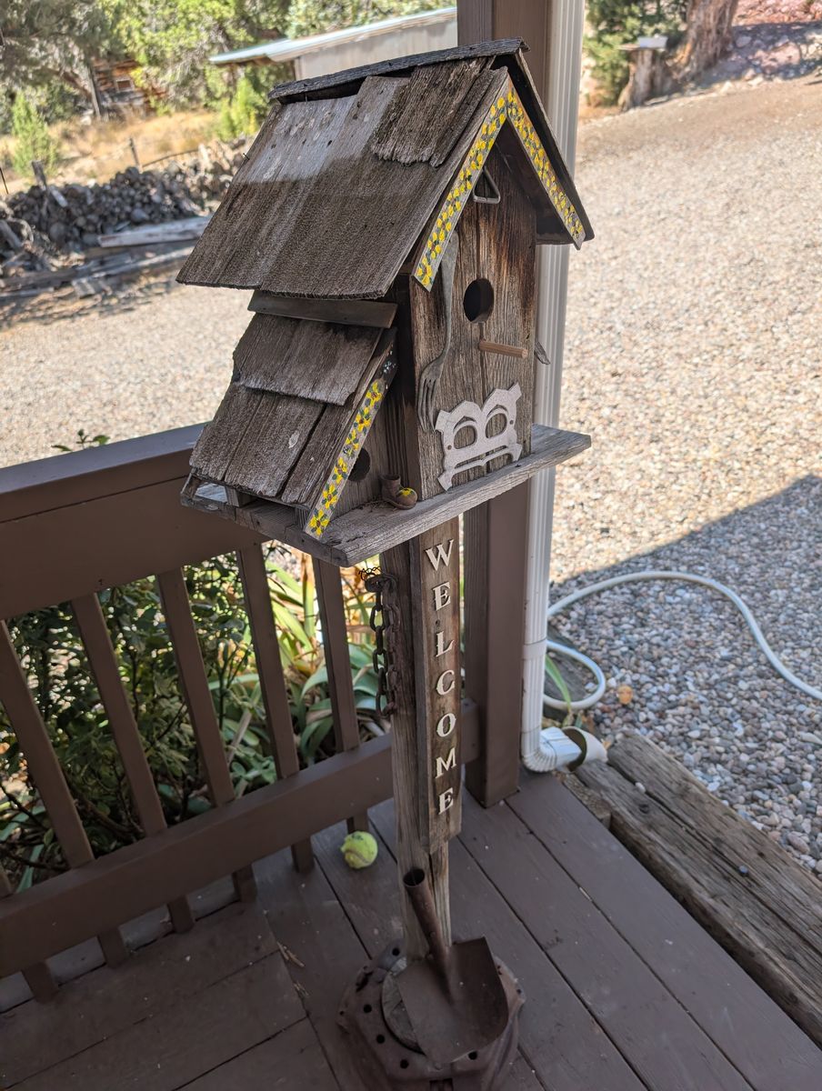 Cute rustic wooden Bird house with Welcome