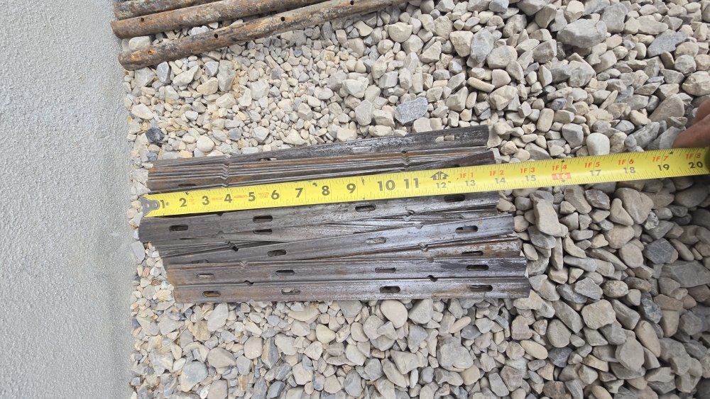concrete stakes, broom, flat ties, caps