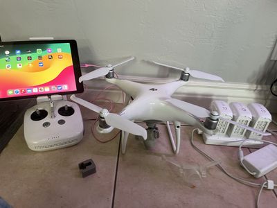 DJI Phantom 4 Pro Drone with Remote, Batteries, and Charger - White
