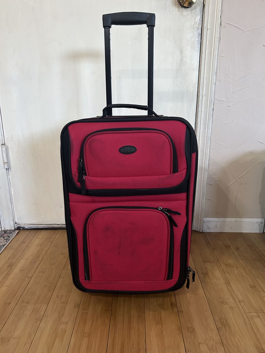Red Carry on luggage w/wheels & handle
