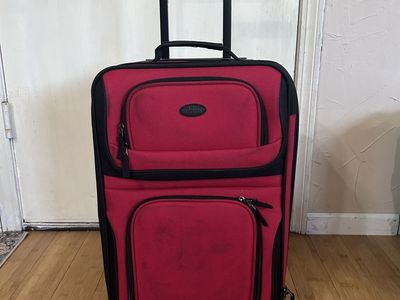 Red Carry on luggage w/wheels & handle