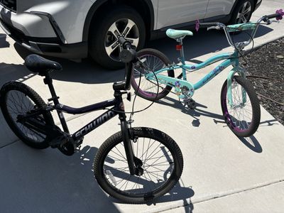 Schwinn Kids' Bicycles - Two bikes, one blue and one dark purple. $100 for both
