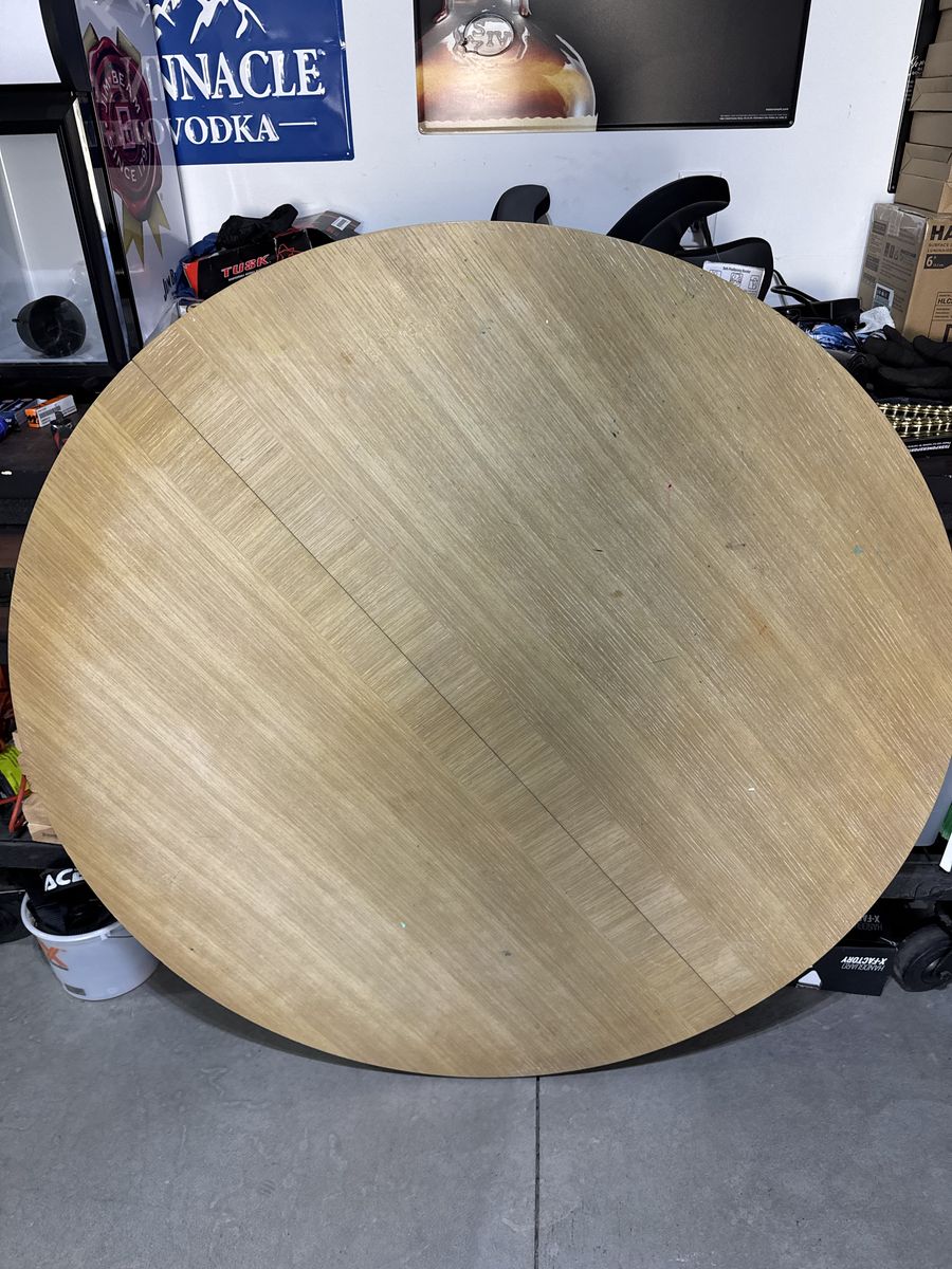 Round kitchen table with leaf.