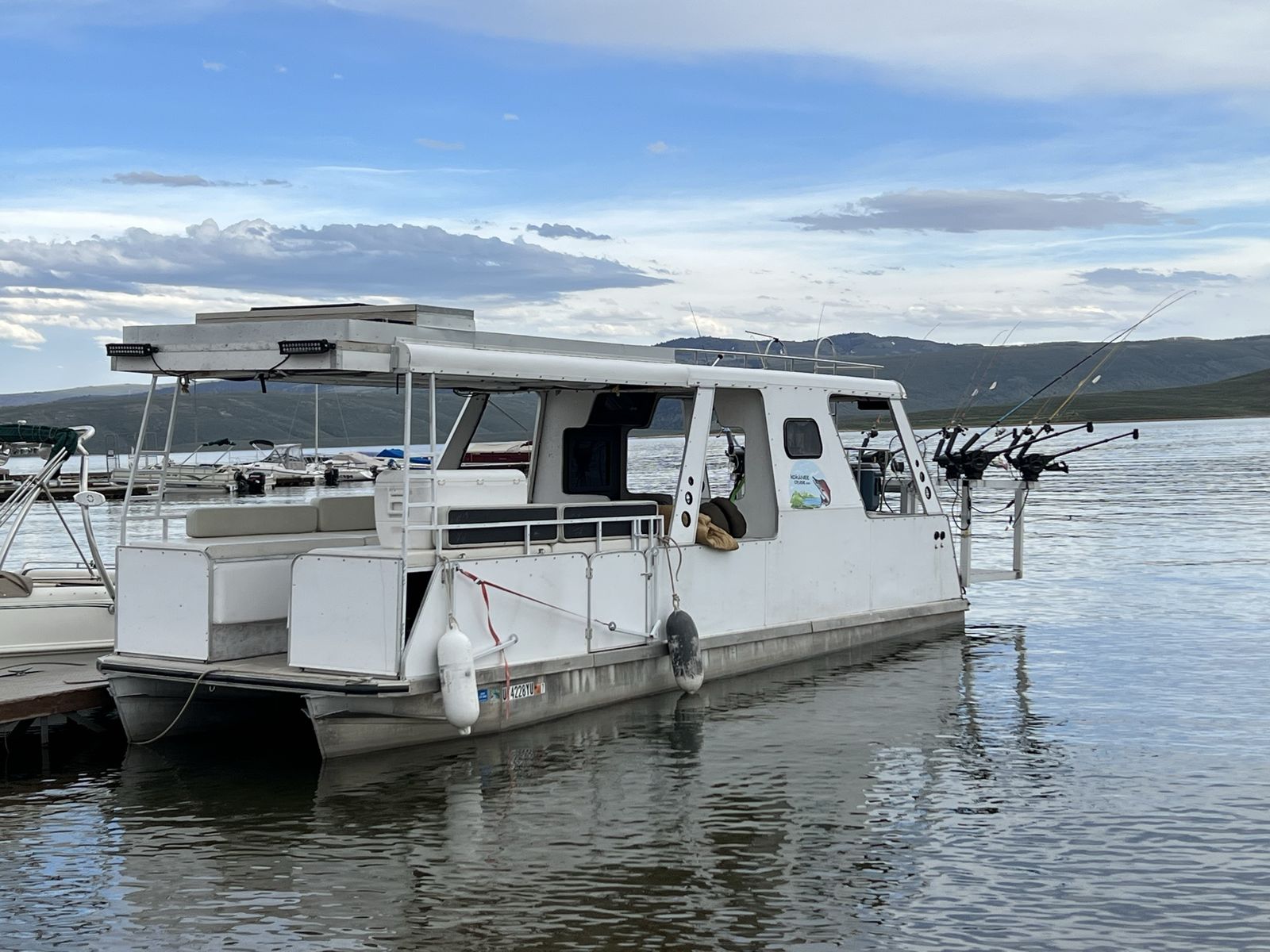 Pontoon party barge fishing boat