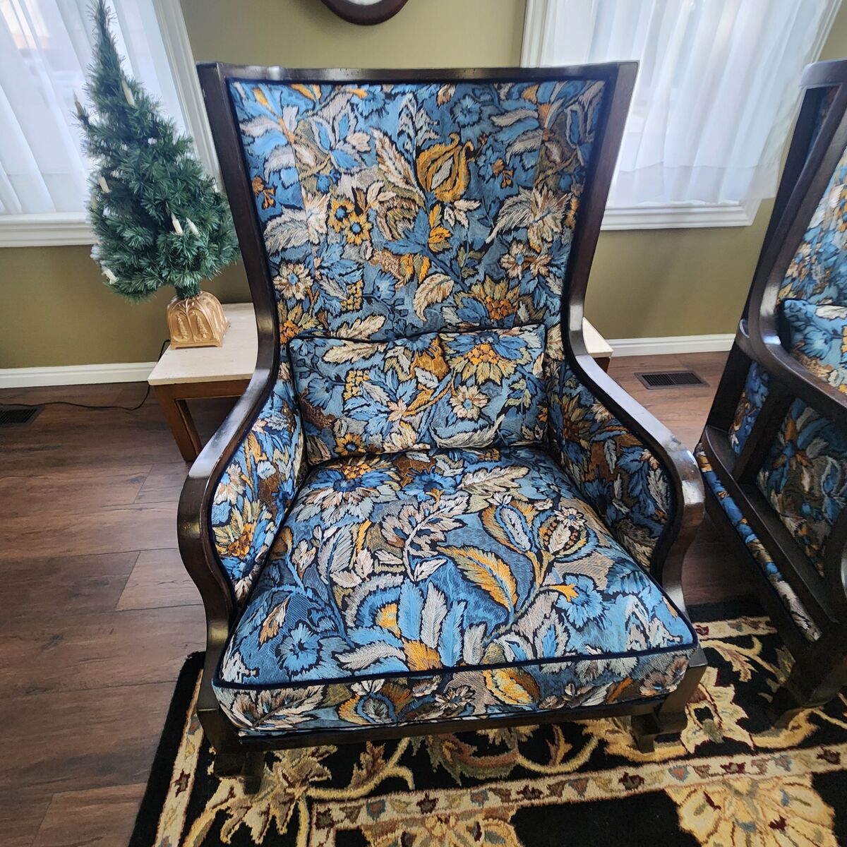 Chairs - TWO Vintage Traditional wingback with a dark wood frame and richly patterned Jacquard floral upholstery.