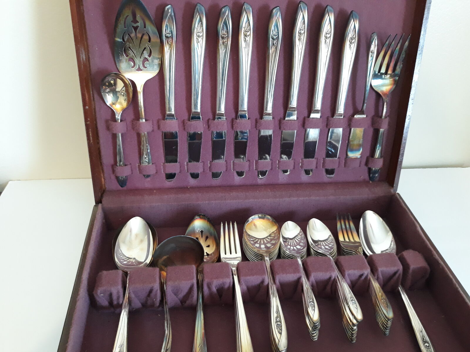 vintage silverware set in tulip pattern
