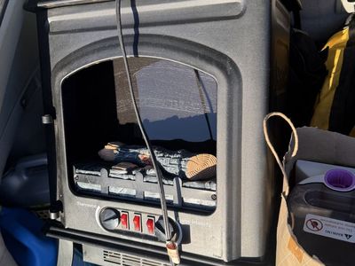 Fake log fire space heater