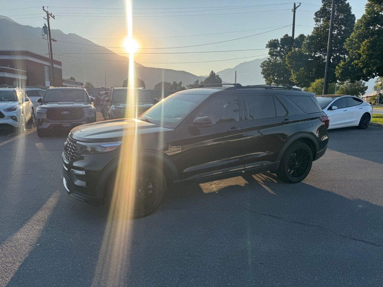 2020 Ford Explorer ST — rebuilt & branded title, 3% below market