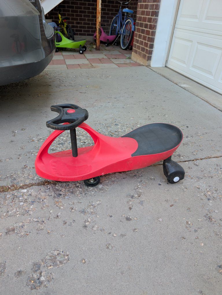 Classic Red Wiggle Car Ride-On Toy - Fun for Kids! No Batteries or Pedals Needed