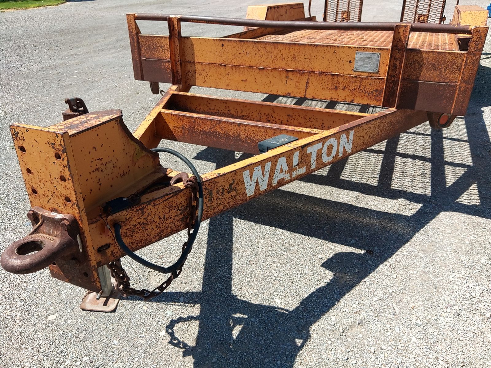 Walton Equipment Trailer spring assist ramps.