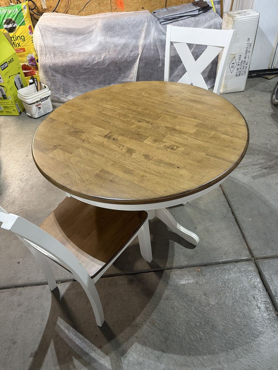 Round Wood Top Dining Table and 2 White X-Back Chairs