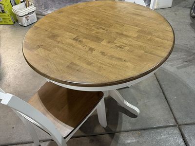 Round Wood Top Dining Table and 2 White X-Back Chairs