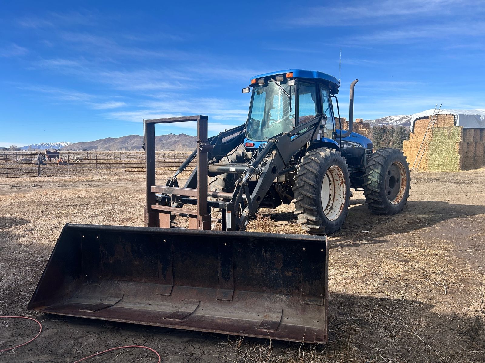 2004 New Holland TV145 bi directional tractor