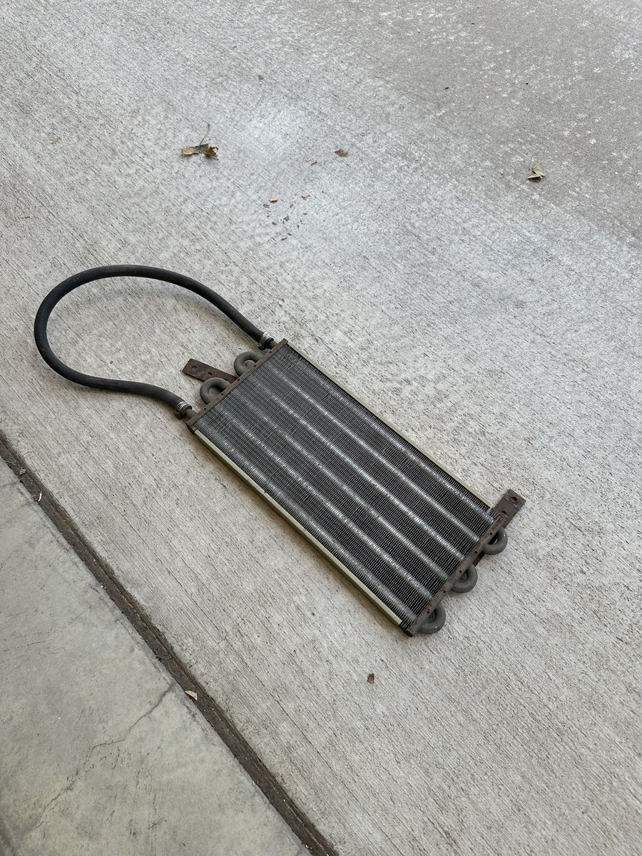 Used Transmission Oil Cooler with Attached Hose and Mounting Brackets