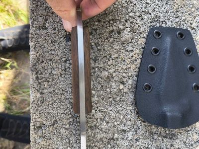 handmade ring knife with wood handles