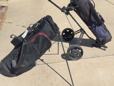 Black and red or blue golf bag with stand
