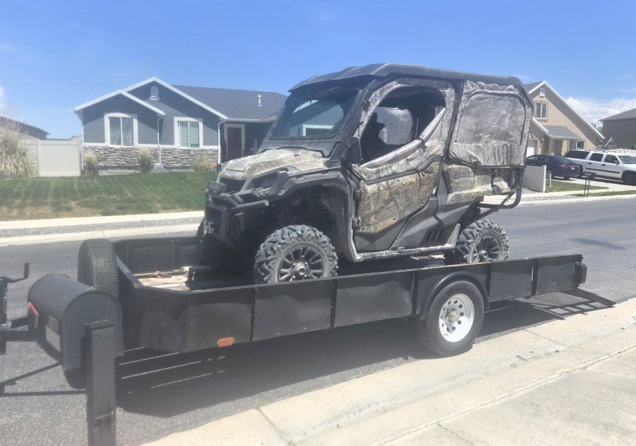 Camo UTV Utility Vehicle on Trailer