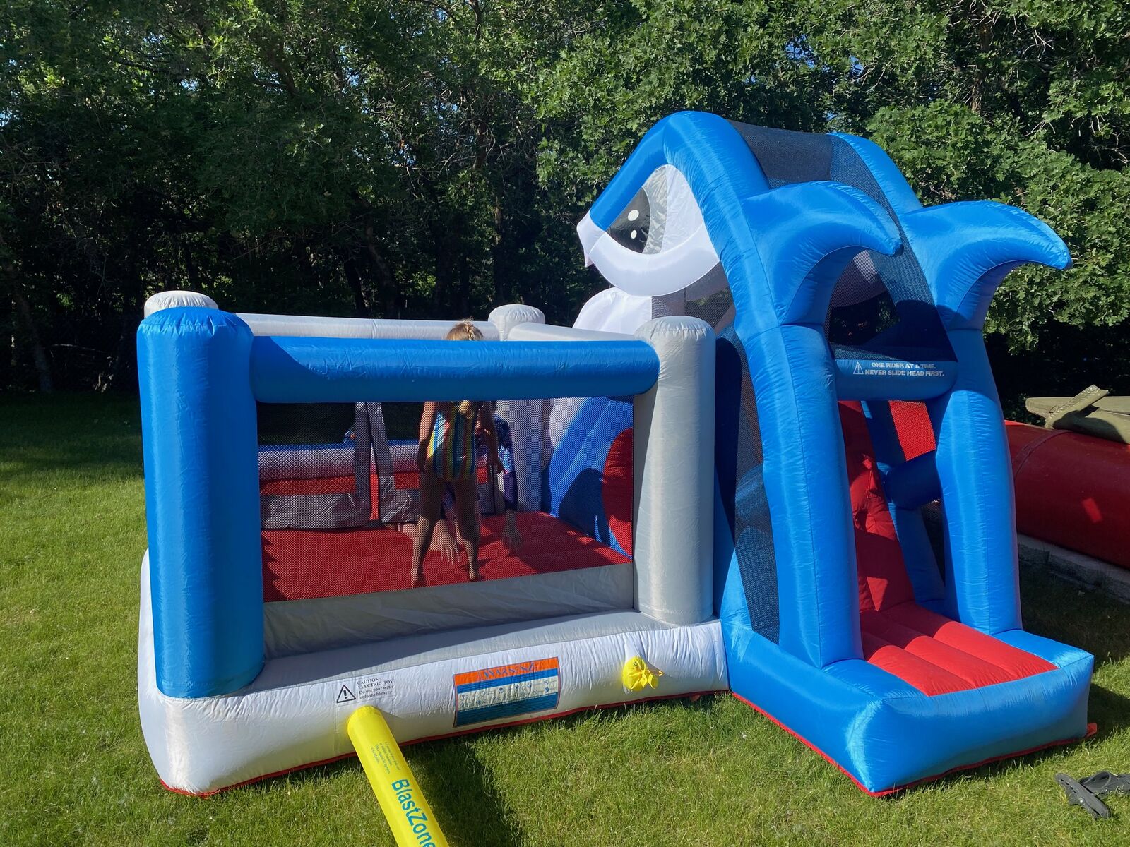 Bounce house, wading pool, climbing wall, tunnel, slide