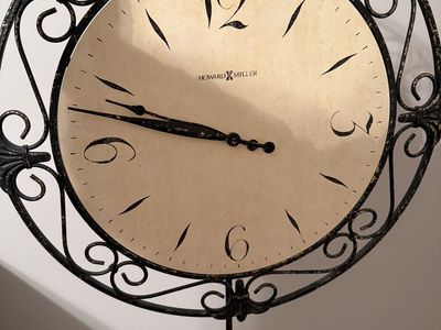 Howard Miller Decorative Wrought Iron Wall Clock