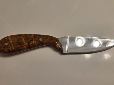Simple drop point hunting/carry knife with beautiful Aspen Burl grip